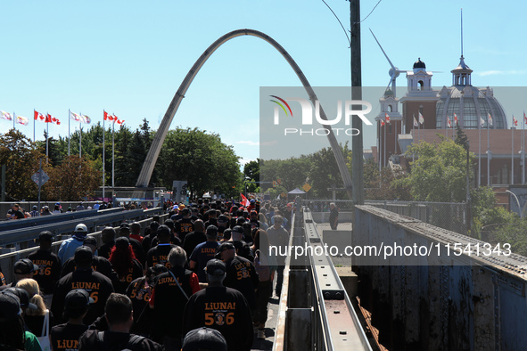 A large number of people participate in the Labour Day Parade in Downtown Toronto, Canada, on September 2, 2024. 