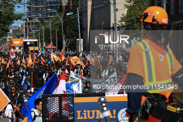 A large number of people participate in the Labour Day Parade in Downtown Toronto, Canada, on September 2, 2024. 