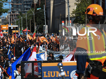 A large number of people participate in the Labour Day Parade in Downtown Toronto, Canada, on September 2, 2024. (