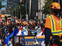 A large number of people participate in the Labour Day Parade in Downtown Toronto, Canada, on September 2, 2024. (