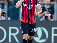 Strahinja Pavlovic of AC Milan celebrates after scoring first goal during the Serie A Enilive match between SS Lazio and AC Milan at Stadio...