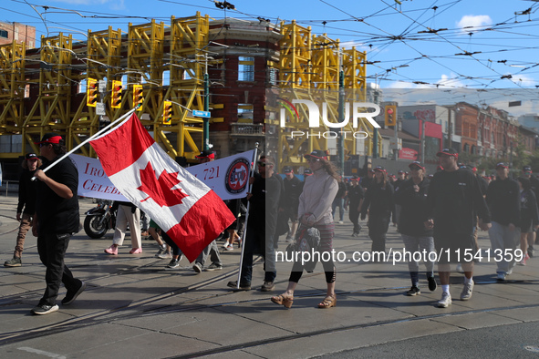 A large number of people participate in the Labour Day Parade in Downtown Toronto, Canada, on September 2, 2024. 