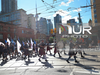 A large number of people participate in the Labour Day Parade in Downtown Toronto, Canada, on September 2, 2024. (