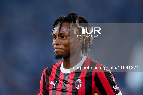 Samuel Chukwueze of AC Milan looks on during the Serie A Enilive match between SS Lazio and AC Milan at Stadio Olimpico on Aug 31, 2024 in R...