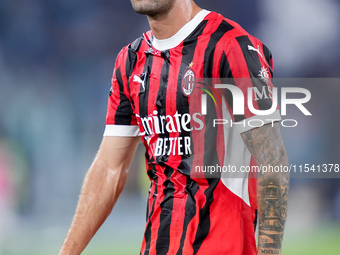 Christian Pulisic of AC Milan looks on during the Serie A Enilive match between SS Lazio and AC Milan at Stadio Olimpico on Aug 31, 2024 in...