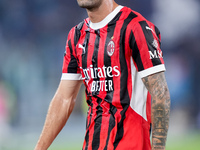 Christian Pulisic of AC Milan looks on during the Serie A Enilive match between SS Lazio and AC Milan at Stadio Olimpico on Aug 31, 2024 in...