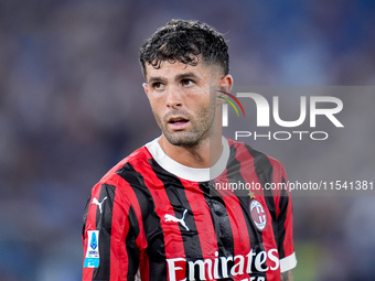 Christian Pulisic of AC Milan looks on during the Serie A Enilive match between SS Lazio and AC Milan at Stadio Olimpico on Aug 31, 2024 in...