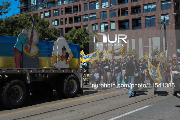 A large number of people participate in the Labour Day Parade in Downtown Toronto, Canada, on September 2, 2024. 