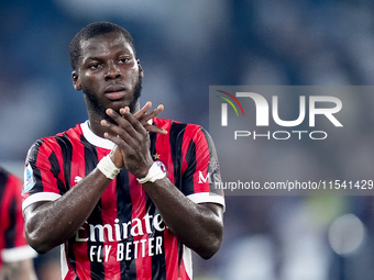 Yunus Musah of AC Milan applauds supporters during the Serie A Enilive match between SS Lazio and AC Milan at Stadio Olimpico on Aug 31, 202...