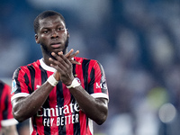 Yunus Musah of AC Milan applauds supporters during the Serie A Enilive match between SS Lazio and AC Milan at Stadio Olimpico on Aug 31, 202...