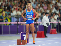 Valentina Petrillo of Italy in action in Women's 400m - T12 Semi-Finals during the Paris 2024 Paralympic Games at Stade de France on Septemb...