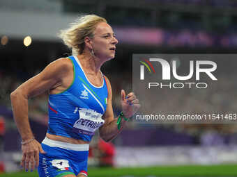 Valentina Petrillo of Italy in action in Women's 400m - T12 Semi-Finals during the Paris 2024 Paralympic Games at Stade de France on Septemb...