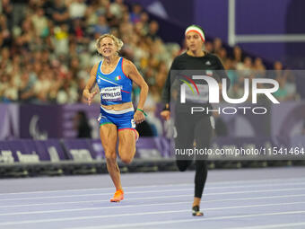 Valentina Petrillo of Italy in action in Women's 400m - T12 Semi-Finals during the Paris 2024 Paralympic Games at Stade de France on Septemb...