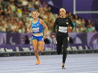 Valentina Petrillo of Italy in action in Women's 400m - T12 Semi-Finals during the Paris 2024 Paralympic Games at Stade de France on Septemb...