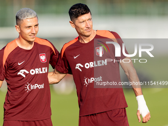 Bartosz Slisz, Robert Lewandowski during training before UEFA Nations League matches in Ksiazenice, Poland on September 02, 2024. (