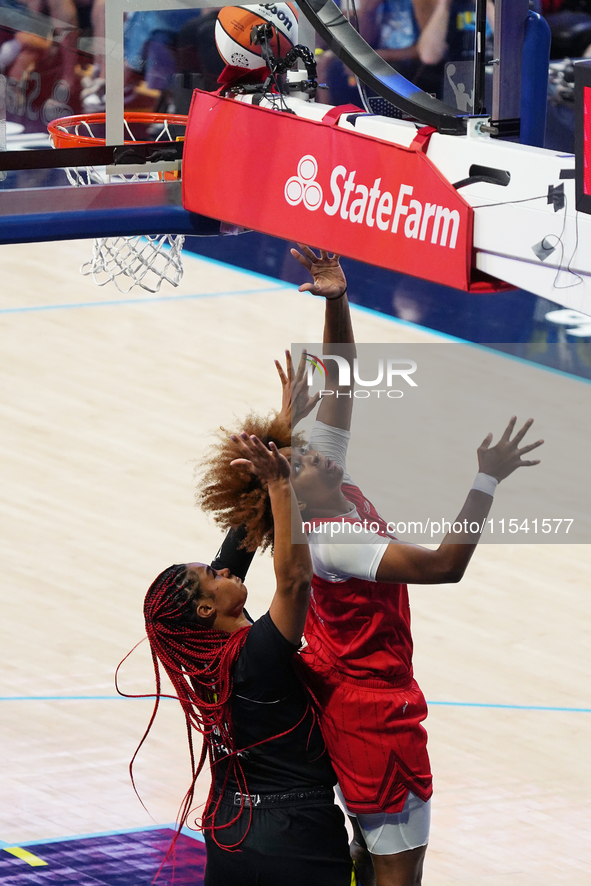 Indiana forward NaLyssa Smith #1 drives to the basket during the WNBA match against Dallas Wings at College Park Center. Indiana Fever defea...