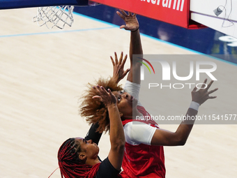 Indiana forward NaLyssa Smith #1 drives to the basket during the WNBA match against Dallas Wings at College Park Center. Indiana Fever defea...