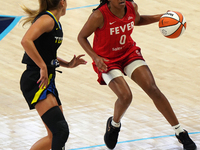 Indiana guard Kelsey Mitchell #0 handles the ball during the WNBA match against Dallas Wings at College Park Center. Indiana Fever defeat Da...