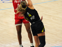 Indiana guard Kelsey Mitchell #0 shoots the ball over Dallas guard Jacy Sheldon #4 during the WNBA match against the Dallas Wings at College...