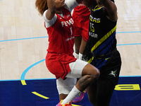 Indiana forward NaLyssa Smith #1 drives to the basket during the WNBA match against Dallas Wings at College Park Center. Indiana Fever defea...