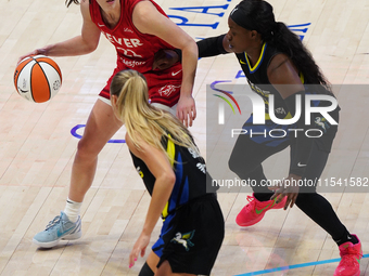 Indiana guard Caitlin Clark #22 handles the ball during the WNBA match against Dallas Wings at College Park Center. Indiana Fever defeat Dal...