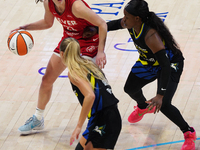 Indiana guard Caitlin Clark #22 handles the ball during the WNBA match against Dallas Wings at College Park Center. Indiana Fever defeat Dal...