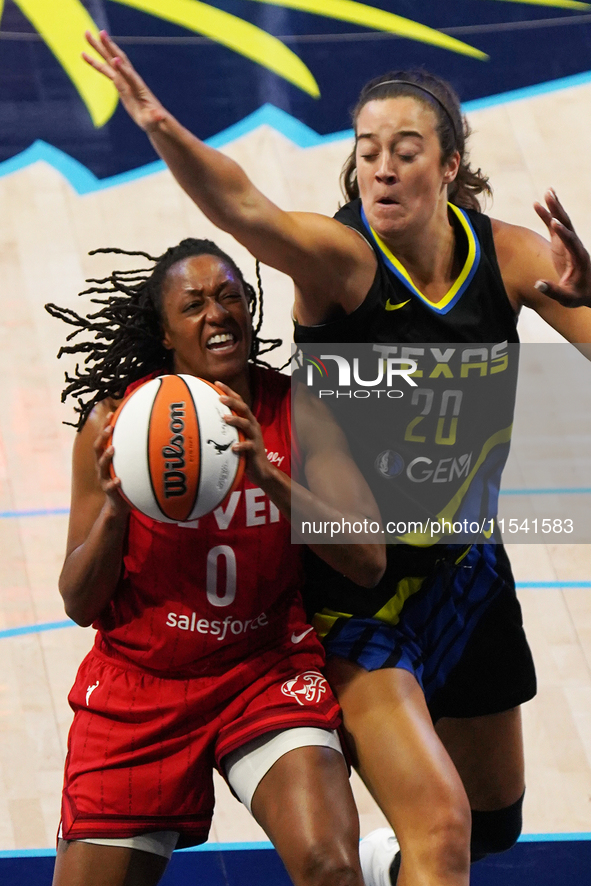 Indiana guard Kelsey Mitchell #0 drives to the basket during the WNBA match against Dallas Wings at College Park Center. Indiana Fever defea...