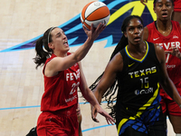 Indiana guard Caitlin Clark #22 drives to the basket during the WNBA match against Dallas Wings at College Park Center. Indiana Fever defeat...