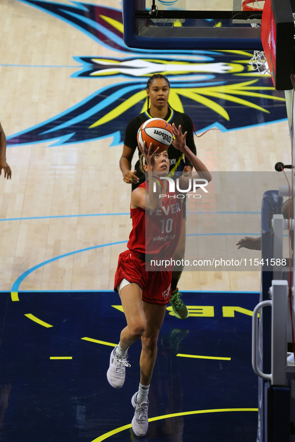 Indiana guard Lexie Hull #10 drives to the basket during the WNBA match against the Dallas Wings at College Park Center. Indiana Fever defea...