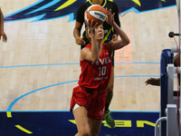 Indiana guard Lexie Hull #10 drives to the basket during the WNBA match against the Dallas Wings at College Park Center. Indiana Fever defea...