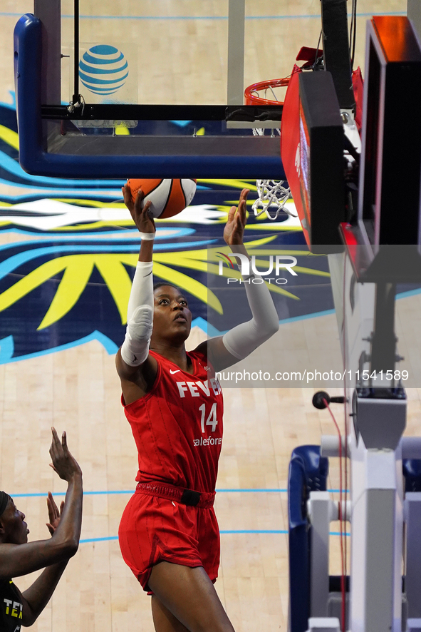 Indiana center Temi Fagbenle #14 drives to the basket during the WNBA match against Dallas Wings at College Park Center. Indiana Fever defea...