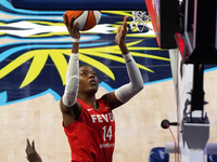 Indiana center Temi Fagbenle #14 drives to the basket during the WNBA match against Dallas Wings at College Park Center. Indiana Fever defea...