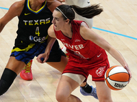 Indiana guard Caitlin Clark #22 handles the ball during the WNBA match against Dallas Wings at College Park Center. Indiana Fever defeat Dal...