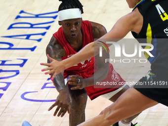 Indiana guard Erica Wheeler #17 passes the ball during the WNBA match against the Dallas Wings at College Park Center. Indiana Fever defeat...