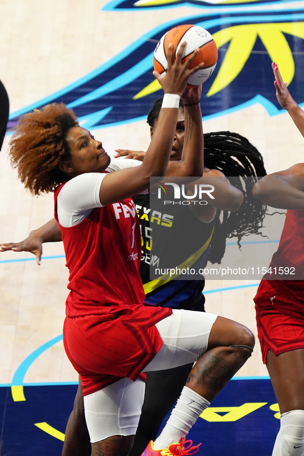 Indiana forward NaLyssa Smith #1 drives to the basket during the WNBA match against Dallas Wings at College Park Center. Indiana Fever defea...