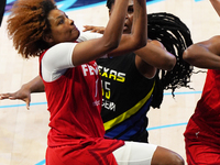 Indiana forward NaLyssa Smith #1 drives to the basket during the WNBA match against Dallas Wings at College Park Center. Indiana Fever defea...