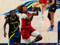 Indiana forward NaLyssa Smith #1 drives to the basket during the WNBA match against Dallas Wings at College Park Center. Indiana Fever defea...