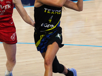 Dallas guard Jacy Sheldon #4 drives to the basket during the WNBA match against Indiana Fever at College Park Center. Indiana Fever defeat D...