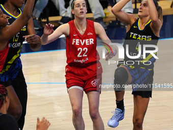 Dallas guard Jacy Sheldon #4 drives to the basket during the WNBA match against Indiana Fever at College Park Center. Indiana Fever defeat D...