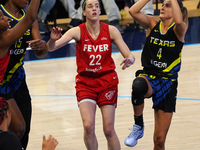 Dallas guard Jacy Sheldon #4 drives to the basket during the WNBA match against Indiana Fever at College Park Center. Indiana Fever defeat D...