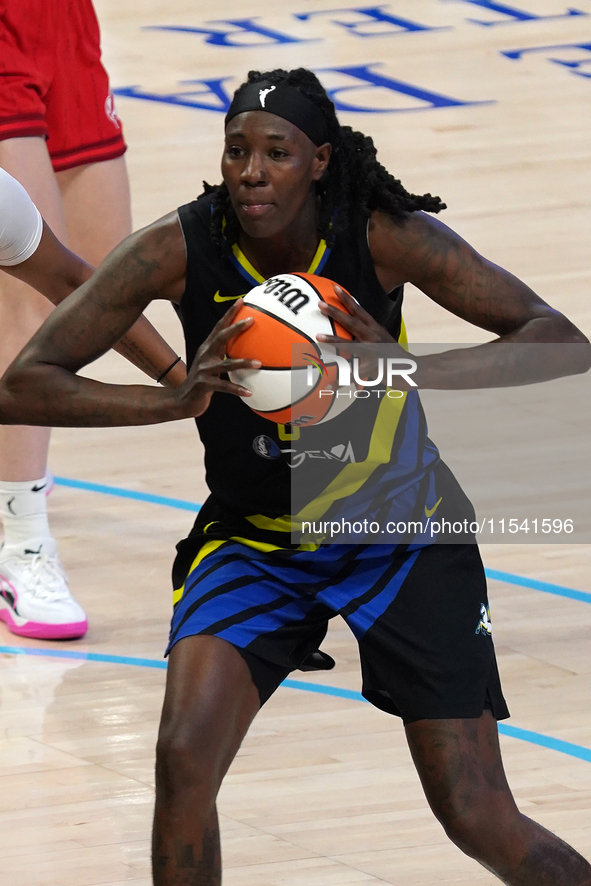 Dallas forward Natasha Howard #6 handles the ball during the WNBA match against Indiana Fever at College Park Center. Indiana Fever defeat D...