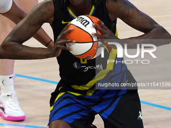 Dallas forward Natasha Howard #6 handles the ball during the WNBA match against Indiana Fever at College Park Center. Indiana Fever defeat D...