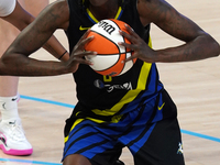 Dallas forward Natasha Howard #6 handles the ball during the WNBA match against Indiana Fever at College Park Center. Indiana Fever defeat D...