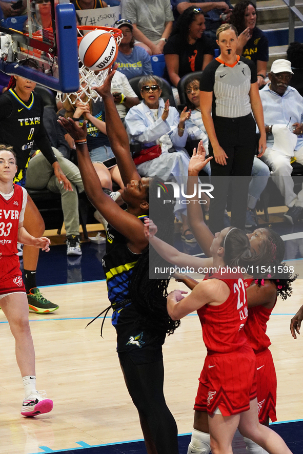 Dallas center Teaira McCowan #15 drives to the basket during the WNBA match against Indiana Fever at College Park Center. Indiana Fever defe...