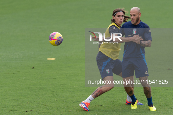 Riccardo Calafiori and Federico Dimarco attend the Italian national team training in Florence, Italy, at Centro Tecnico Federale in Covercia...