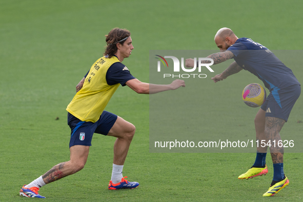 Riccardo Calafiori and Federico Dimarco attend the Italian national team training in Florence, Italy, at Centro Tecnico Federale in Covercia...