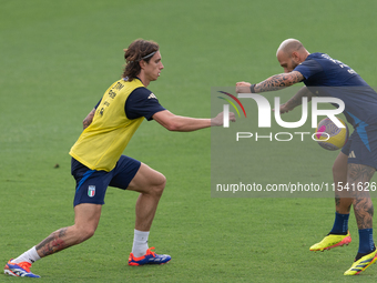 Riccardo Calafiori and Federico Dimarco attend the Italian national team training in Florence, Italy, at Centro Tecnico Federale in Covercia...