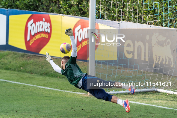 Goalkeeper Guglielmo Vicario is in action during the Italian National Team training camp at Centro Tecnico Federale in Coverciano, Florence,...