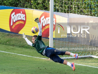 Goalkeeper Guglielmo Vicario is in action during the Italian National Team training camp at Centro Tecnico Federale in Coverciano, Florence,...