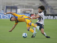 Cesar Huerta #12 of Pumas and Jesus Angulo #27 of Tigres battle for the ball during Matchday 6 as part of the Torneo de Apertura 2024 Liga M...